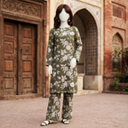 Close-up of premium cotton silk fabric texture and print details, unstitched suit material.