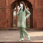 Premium 2-piece embroidered unstitched lawn suit collection by ZH2 Store, featuring a 1.2-meter embroidered shirt and 2.2-meter trouser fabric with intricate ethnic designs displayed on a mannequin.