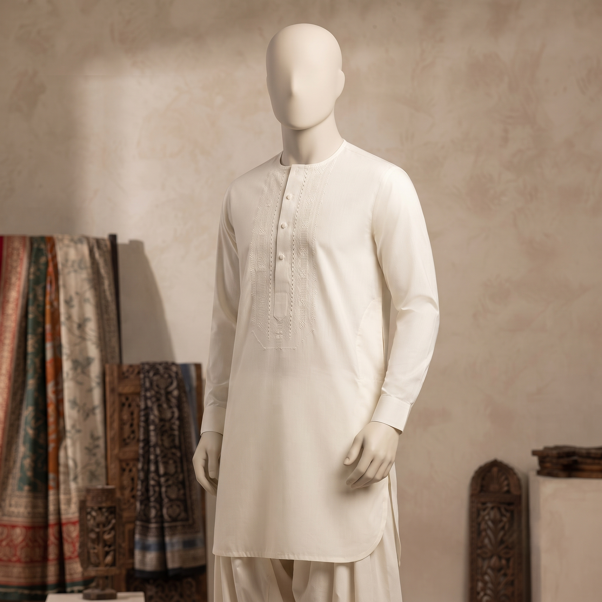 A studio view of the classic off-white round neck kurta from ZH2 Store, showcasing the subtle embroidery detail.