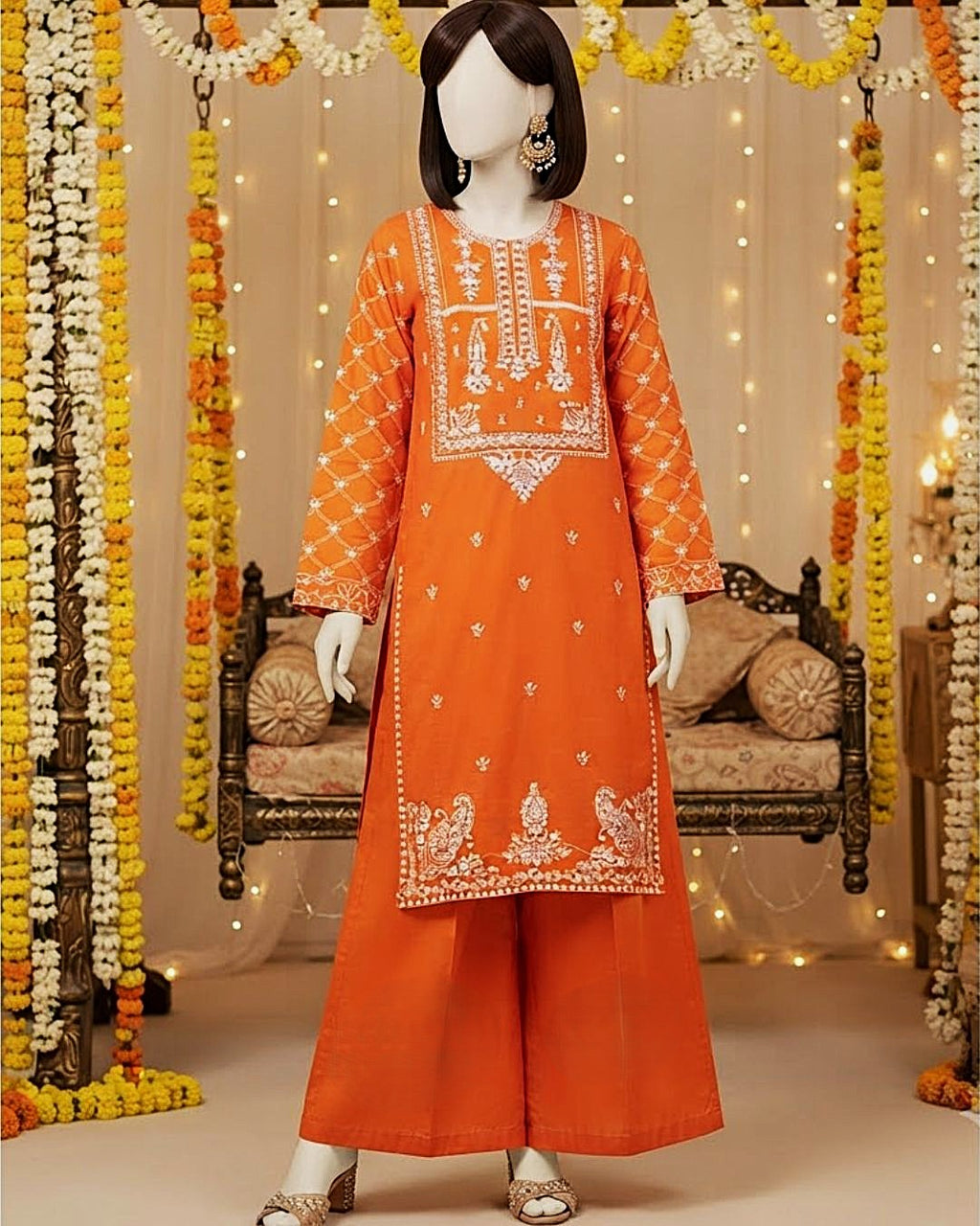 Vibrant orange 2-piece unstitched embroidered lawn suit with matching trousers displayed on a mannequin.