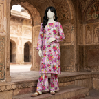 "Woman wearing a premium cotton-silk unstitched 2-piece suit with sophisticated artistic prints from ZH2 Store."
