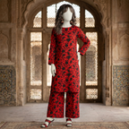 "Mannequin showcasing a bold red and black floral printed 2-piece cotton silk unstitched suit, available at ZH2 Store."