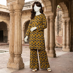 "Woman wearing a mustard and charcoal heart-printed 2-piece unstitched cotton suit"