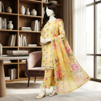 A mannequin displaying the detailed floral print of the yellow 3-piece lawn ensemble.