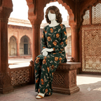 Model wearing a dark green floral printed 2-piece cotton silk unstitched suit by ZH2 Store."