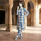"Woman wearing a premium cotton-silk unstitched 2-piece suit with vibrant floral prints from ZH2 Store."