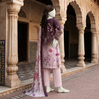 A mannequin displaying a purple and pink floral printed 3-piece unstitched lawn suit.
