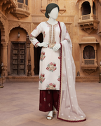 3-piece unstitched embroidered lawn suit with a matching trouser and dupatta displayed on a mannequin.