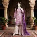 Front view of a mannequin displaying a premium lawn 3-piece suit featuring delicate neckline embroidery and a floral print shirt.