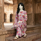 "Woman wearing a premium cotton-silk unstitched 2-piece suit with sophisticated artistic prints from ZH2 Store."