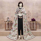 Mannequin wearing a black suit draped in a white floral embroidered chaddar shawl