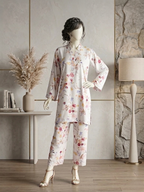 Front view of a mannequin wearing an ivory 2-piece floral printed traditional suit with straight trousers.coordinate set.