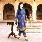 Side angle view of the blue floral print unstitched cotton lawn suit, highlighting the pattern and border details on the shirt and trousers.