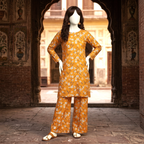 Full-length aesthetic display of the mustard floral 2-piece suit featuring a shirt and matching trouser fabric by ZH2 Store.