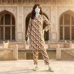 "Woman wearing a premium cotton-silk unstitched 2-piece suit with earth-tone floral prints from ZH2 Store."