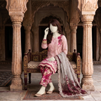 Elegant display of the floral printed breathable cotton suit with matching trousers and dupatta set on a traditional bench at ZH2 Store.