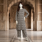"Woman wearing a premium cotton-silk unstitched 2-piece suit with modern geometric printed work from ZH2 Store."