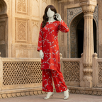 "Woman wearing a premium cotton-silk unstitched 2-piece suit with soft-toned elegant prints from ZH2 Store."