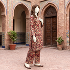 Side view of the red and black unstitched lawn suit, showcasing the intricate patterns from ZH2 Store.