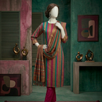 unstitched 3-piece suit featuring magenta and teal striped shirt fabric with matching magenta trousers and a traditional fringe shawl dupatta on a studio mannequin.