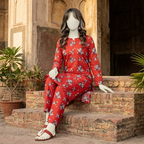 "Woman wearing a premium cotton-silk floral unstitched 2-piece suit from ZH2 Store."