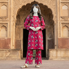 "Woman wearing a premium cotton-silk floral unstitched 2-piece suit from ZH2 Store."