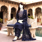 Elegant 3-piece unstitched lawn suit with colorful intricate embroidery on the shirt and trousers, paired with a matching embroidered dupatta, displayed on a mannequin.