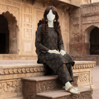 "Mannequin wearing a premium 2-piece unstitched cotton silk suit with  paisley print - ZH2 Store."
