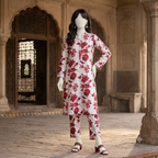 "Woman wearing a premium cotton-silk unstitched 2-piece suit with vibrant floral prints from ZH2 Store."