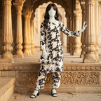 Full length view of women unstitched 2-piece suit with traditional black floral print work - zh2 store