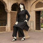 Mannequin wearing a chic black printed cotton unstitched suit, featuring a modern polka dot design by ZH2 Store.