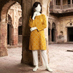 Detailed shot of the yellow patterned 2-piece lawn suit on a mannequin, emphasizing the quality fabric at ZH2 Store.