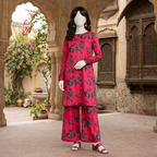 "Woman wearing a premium cotton-silk unstitched 2-piece suit with vibrant floral prints from ZH2 Store."
