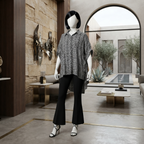 Contemporary monochrome geometric print baggy shirt, styled on a mannequin in a modern interior design setting.
