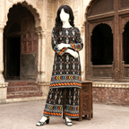 Full view of black printed cotton lawn suit showing detailed patterns and border.
