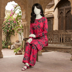 "Woman wearing a premium cotton-silk unstitched 2-piece suit with vibrant floral prints from ZH2 Store."