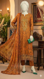 Mannequin wearing an orange embroidered outfit with a matching dupatta in a decorated room.