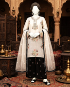 3-piece unstitched embroidered lawn suit with a matching trouser and dupatta displayed on a mannequin.