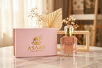 LUCK Extrait De Parfum bottle displayed with ingredients including vanilla beans, cardamom, star anise, and rose petals on marble.